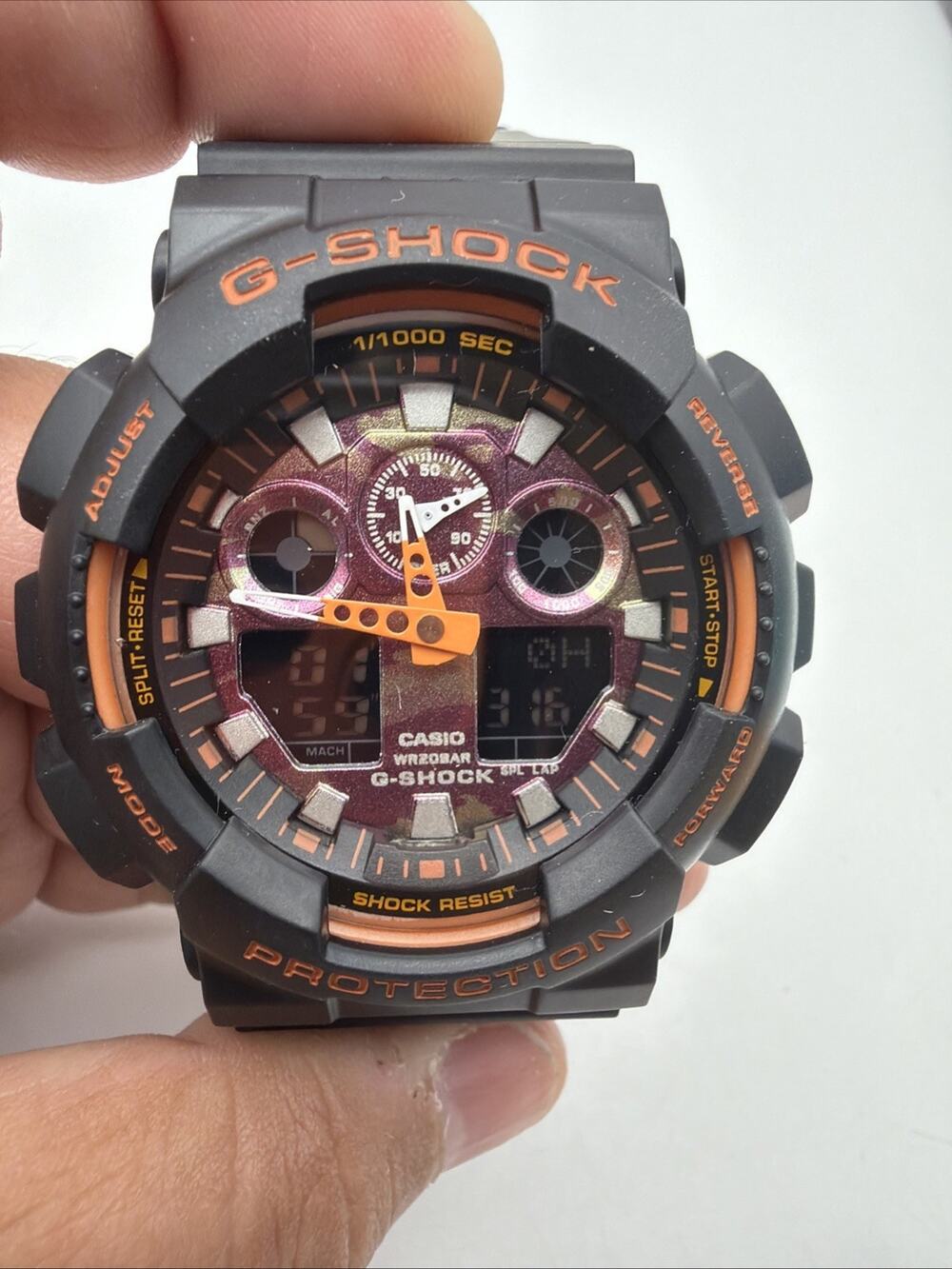 Casio G-Shock GA-100 5081 Black And Orange Pink Dial Camo Watch
